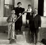 FamilyInFrontOfHouse'34